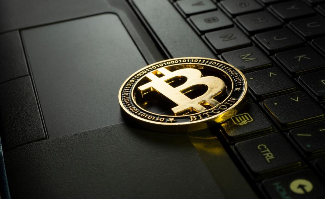 Bitcoin pulls back to three-week low after record-breaking July